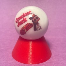 Cracker Jack Glass Marble On Stand. G4