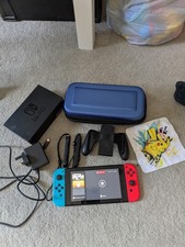 Nintendo Switch 32GB 720p Wi-Fi Console Bundle Neon Red/Blue Joy-Cons