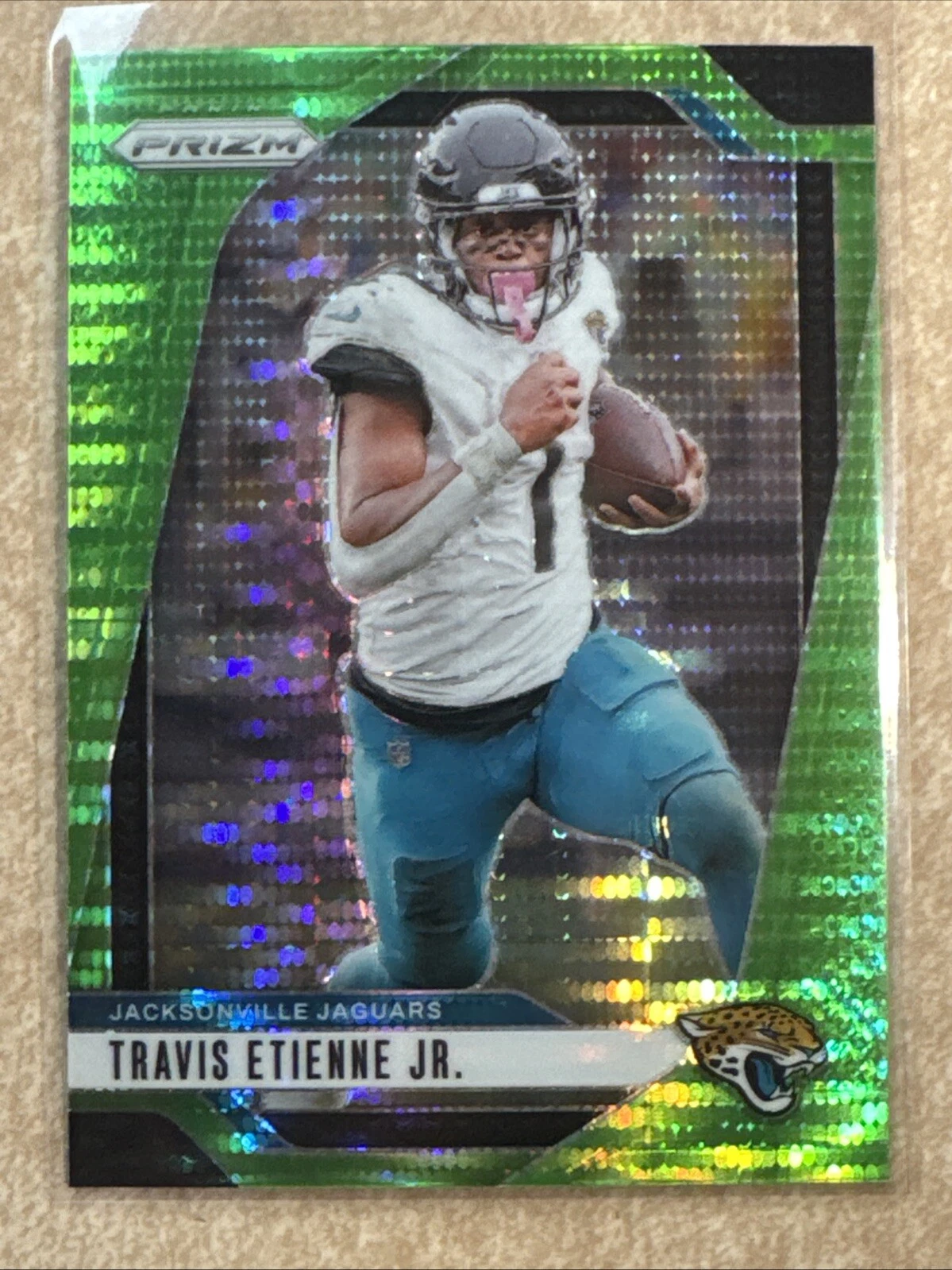2024 Panini Prizm Travis Etienne Jr. Neon Green Pulsar #130 Jaguars