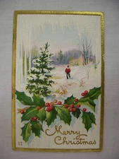 VINTAGE EMBOSSED CHRISTMAS POSTCARD BOY IN SNOW W/ ICICLE & HOLLY BORDER 1912