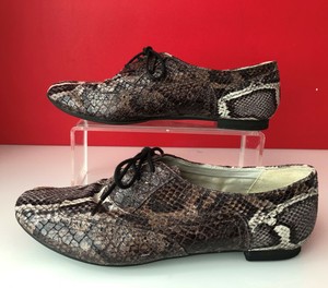 clarks leopard print brogues