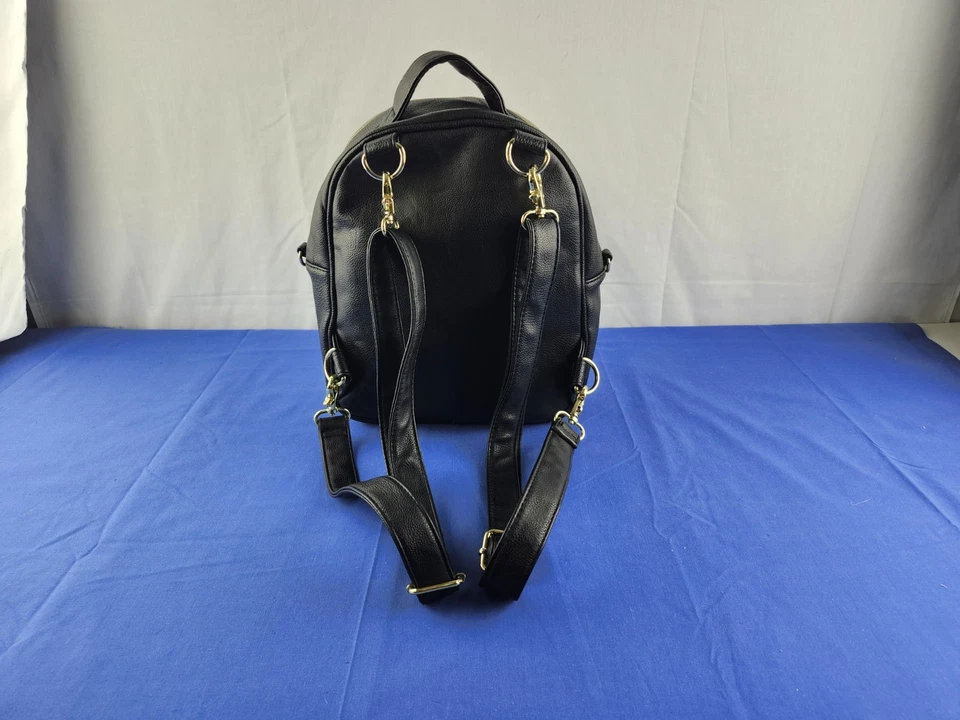 Mini mochila Betsey Johnson a rayas blancas y tostadas Foto 4 de 4