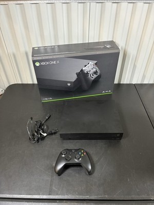 Microsoft Xbox One X 1TB Home Console - Black with a Xbox series  x controller