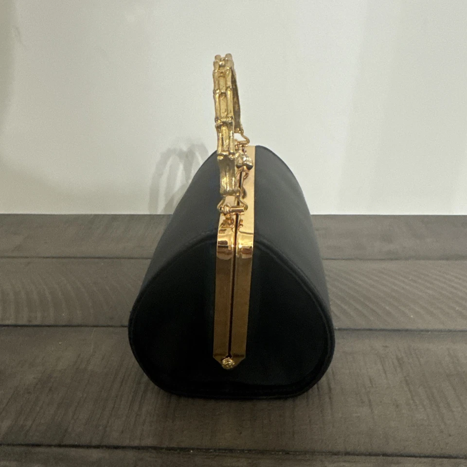 Cartera o bolso de mano vintage Ande’ negro con asa dorada Foto 2 de 4