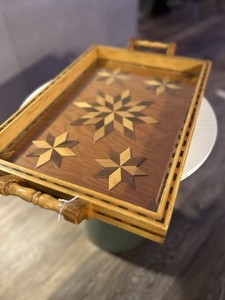 Wooden serving tray with marquetry star pattern inlay