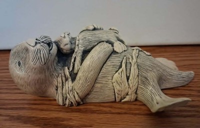 Vintage G.H. Cook Company ''Mama and Baby Sea Otter'' Faux Scrimshaw Sculpture