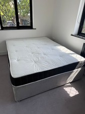 Spotless brand new Divan king size bed base with mattress.