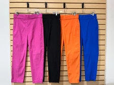 Counterparts pull on pants ankle length stretch front pockets side slits on hem.