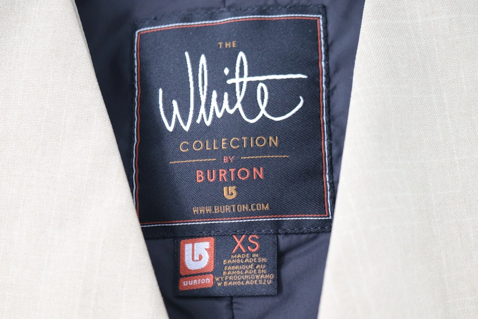 burton the white collection button front sleeveless ski jacket