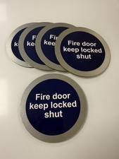 Fire door signs 120mm brushed dibond with overlaid digital print x10 UHB tape