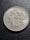 AU 1897 MORGAN SILVER DOLLAR — photo 1