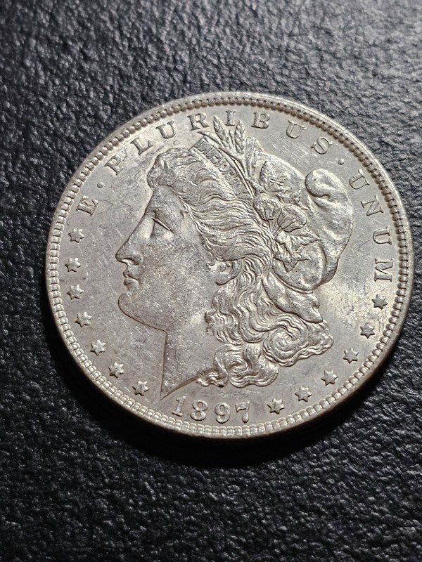 AU 1897 MORGAN SILVER DOLLAR