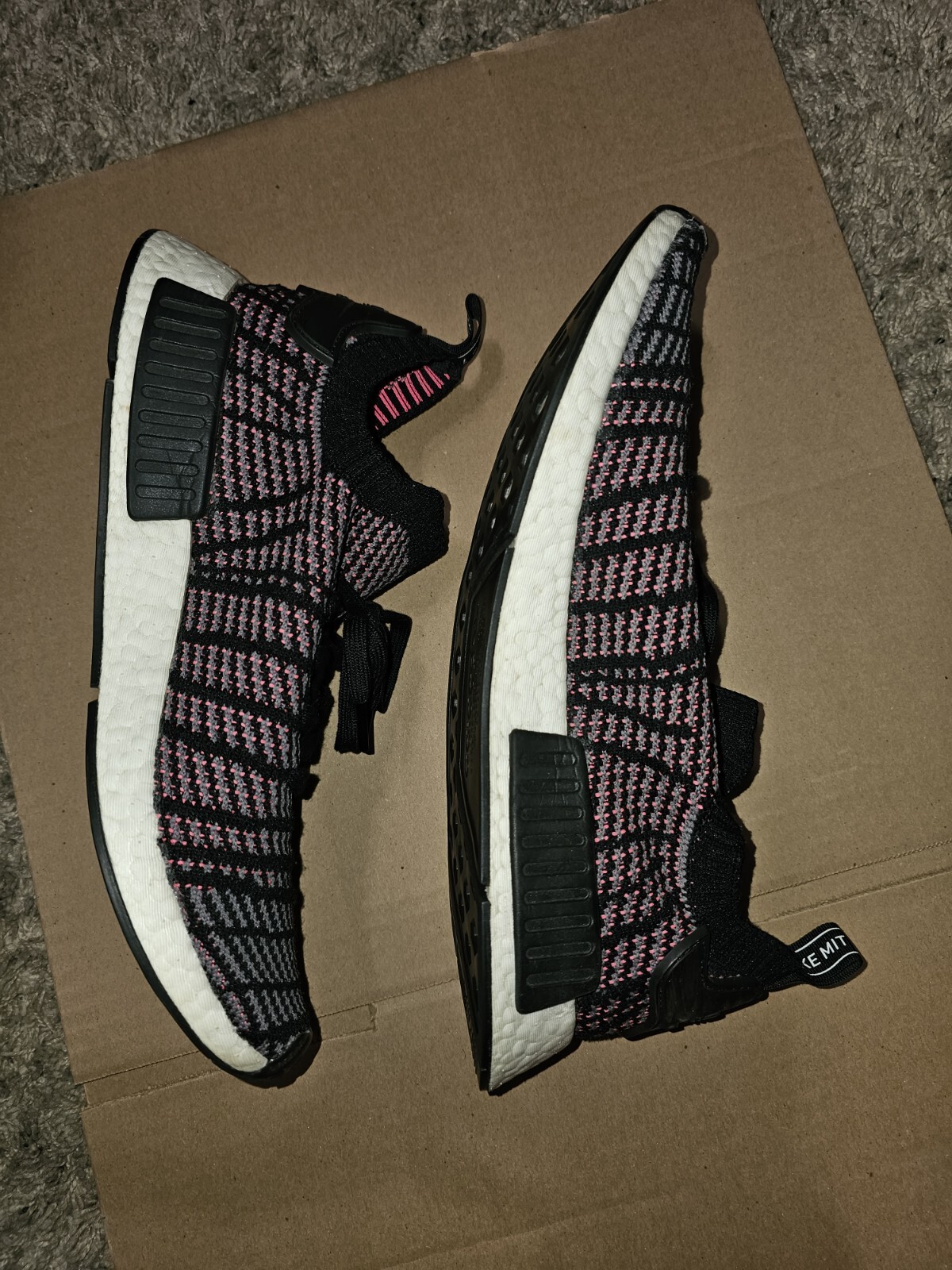 nmd r1 stlt solar pink