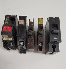 LOT OF 5 MISC. 20 AMP CIRCUIT BREAKERS.