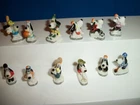 DROOPY SPORTS Set of 12 Miniature Figures Mini French Porcelain FEVES Figurines