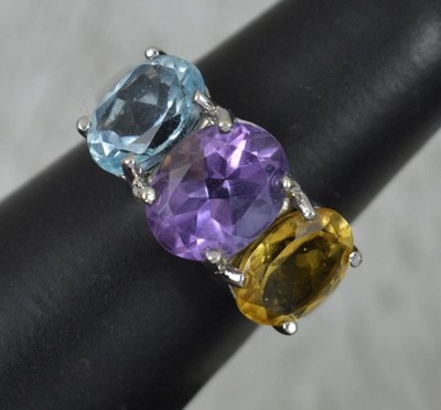 Großer Trilogiering 9 kt Weißgold Amethyst Topas Citrin