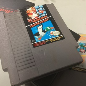 NES Game Lot Of 4 With 2 Mario Bros./Duck Hunt (+ Track Meet) Skate Or Die, Foot