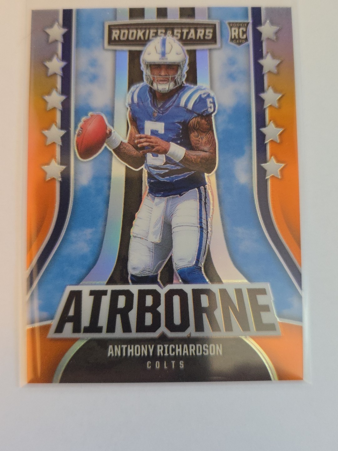 2023 Panini Rookies & Stars - Airborne Orange Prizm Anthony Richardson /25 (RC)