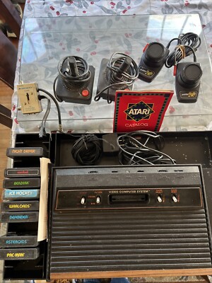 Atari 2600 Video Game Console - 8 Games, 2 Joysticks & 2 Paddle Controllers