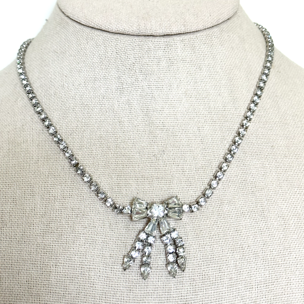 Vintage Parco Designer Clear Ice Rhinestone Silver Tone Bow