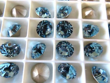 24 Swarovski XILION Rhinestones 47ss Aquamarine/foiled. #1028