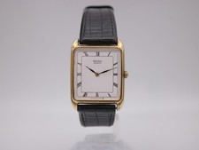 Seiko 6530-5200 vintage quartz watch, gold tone rectangular case, white roman di