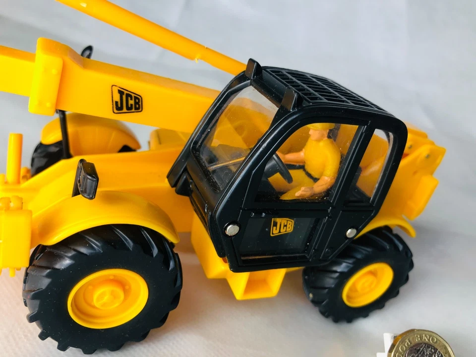 Coche de juguete JCB amarillo vintage ra Foto 2 de 4