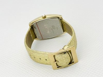 BCBGMAXAZRIA Ladies BG6166 Barrel Shape Gold Tone Case Gold 
