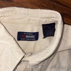 Cream flannel button down shirt with “An Original Five Brother” label, navy stitching, and textured fabric.