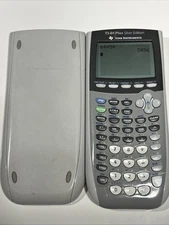 Texas Instruments TI-84 Plus Graphing Calculator Silver Edition W/ Guidebook