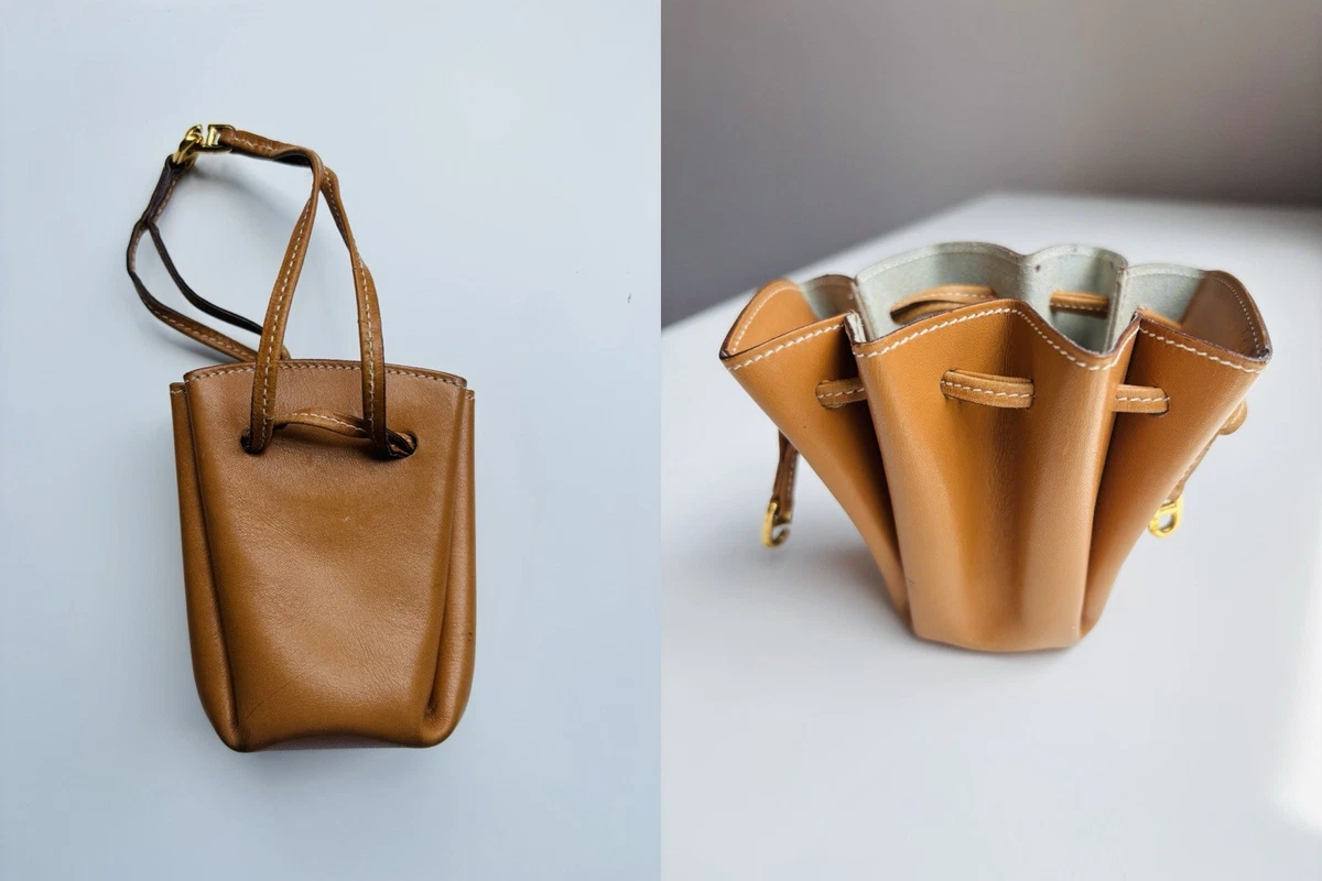Hermès Matelo Slingbag Backpack Brown Leather Perforated H Bucket Bag b5fc297ee7eea771f9bbe78384ea63  main image 3