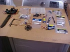 LARGE LOT OF ASSORTED HELICOPTER PARTS: BLADE, E-FLITE, ?? (NEW/USED)