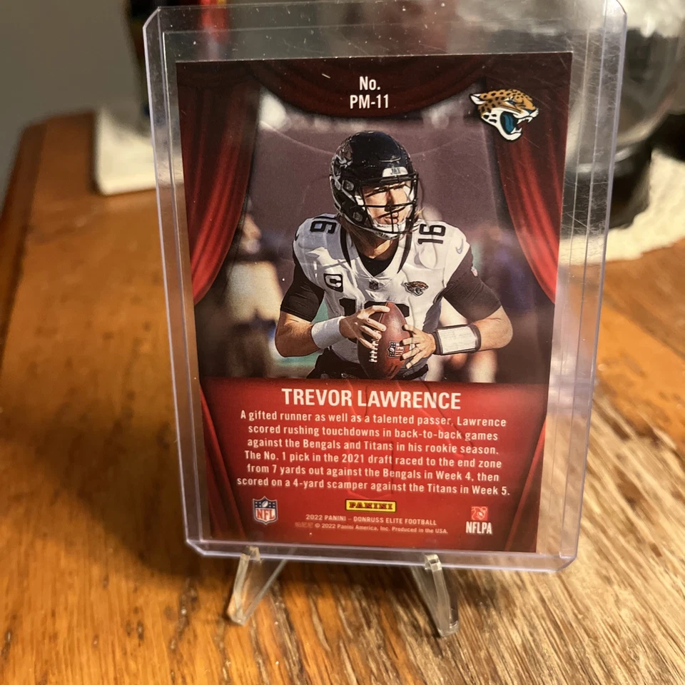 2022 DONRUSS ELITE PLAYMAKERS  PM-11 TREVOR LAWRENCE JAGUARS - Image 2 of 2