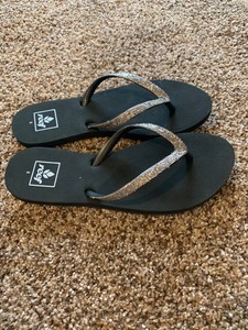 reef sparkle flip flops