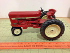 Vintage 1/16 Farmall 560 narrow front tractor w fast hitch for parts or repair