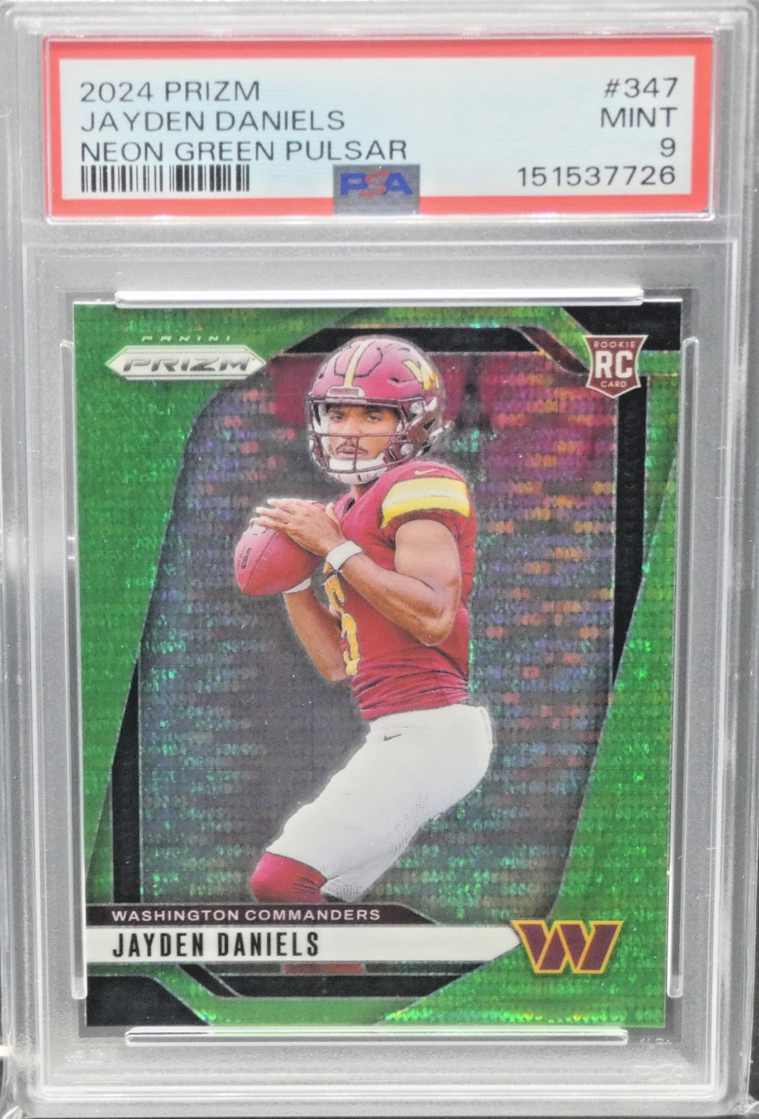 2024 Panini Prizm Neon Green Pulsar Jayden Daniels Rookie Commanders PSA MINT 9 view 1
