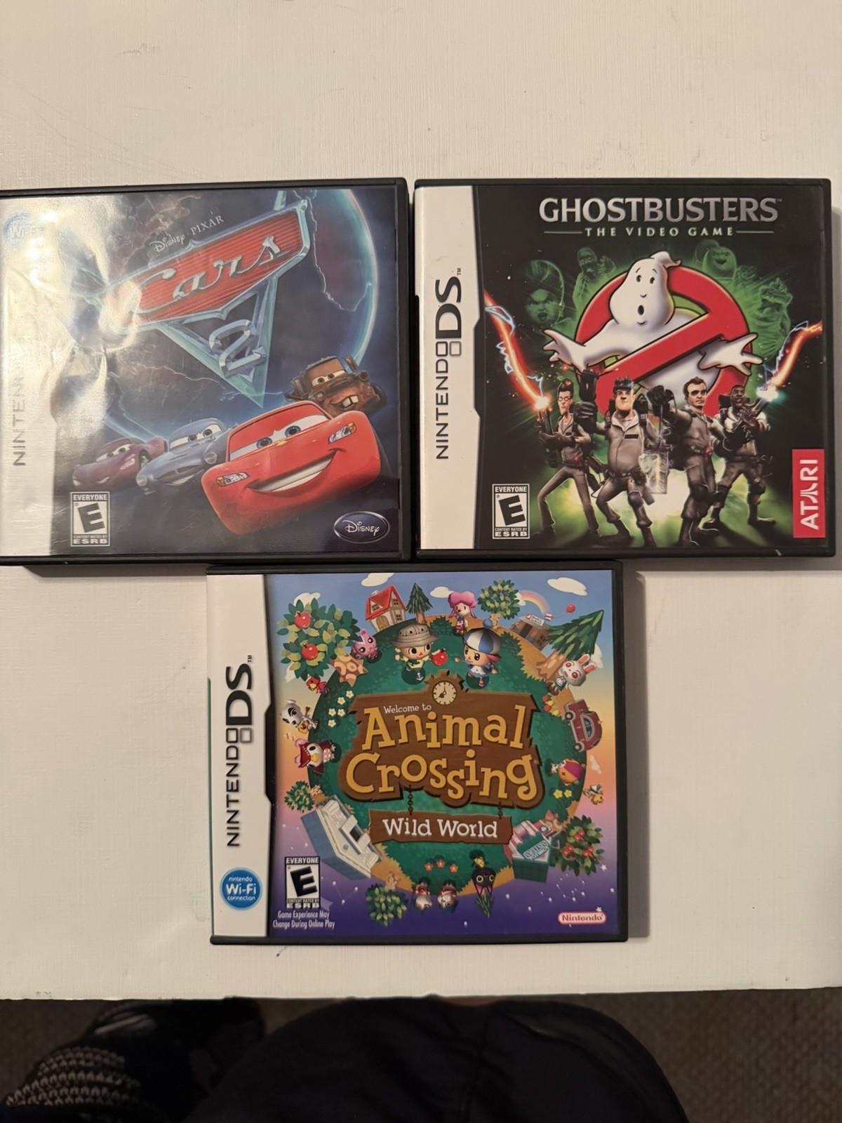 Nintendo DS Lot Of 3 Games Cars, Animal Crossing ,& Ghost Busters Pre Owned