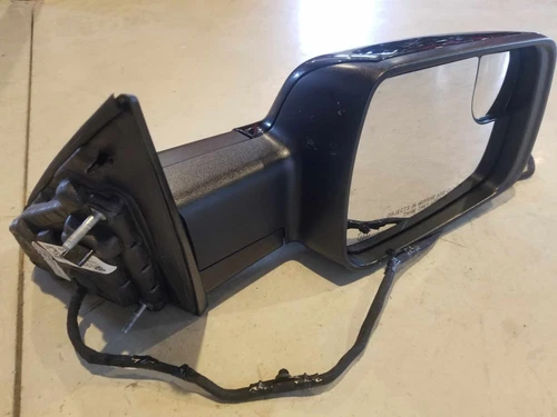 2019-2022 Dodge Ram 1500 Passenger side rear view mirror with slight damage