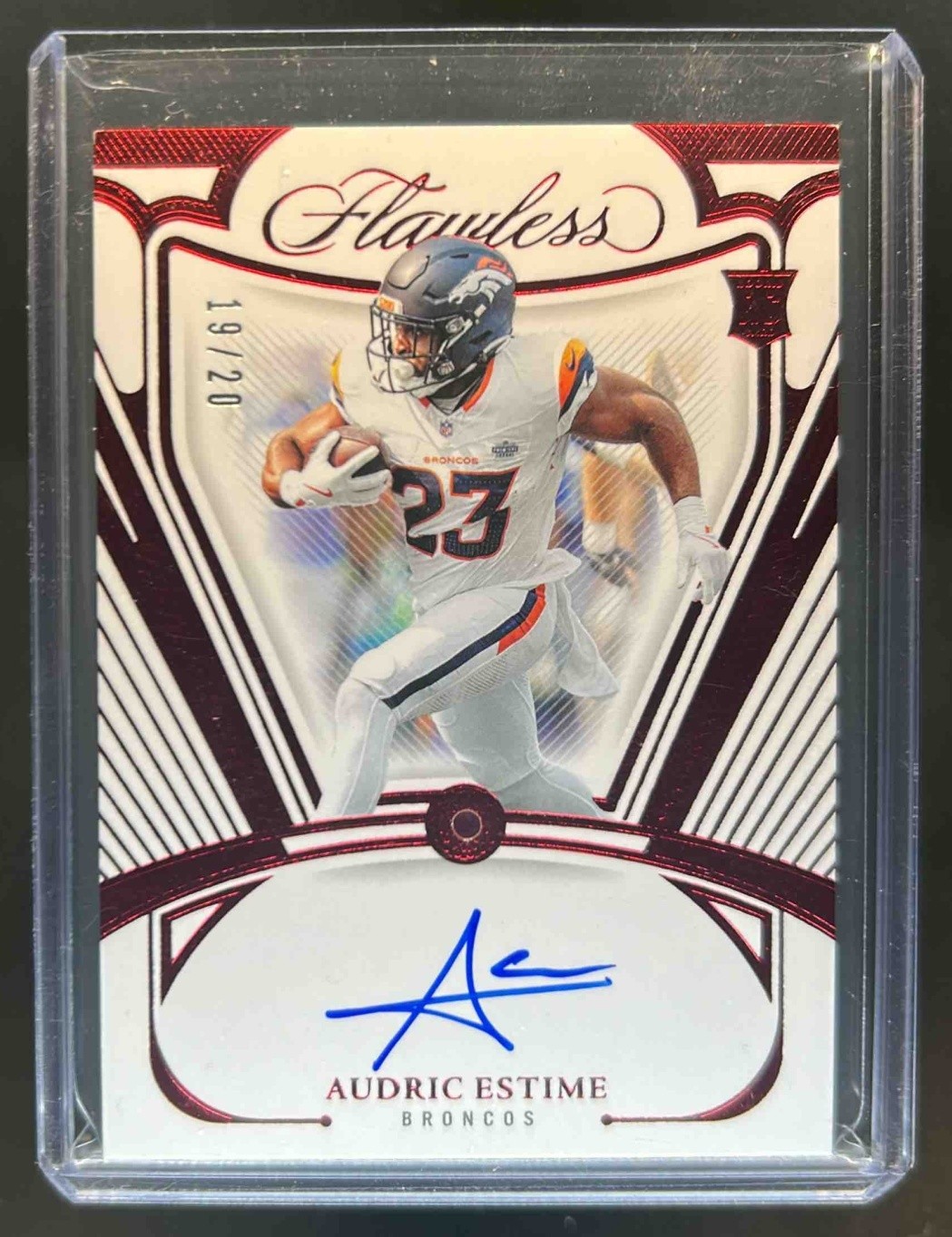 Audric Estime Panini National Treasures Collegiate Flawless Rookie Team Slogan Signatures #AEE Ruby