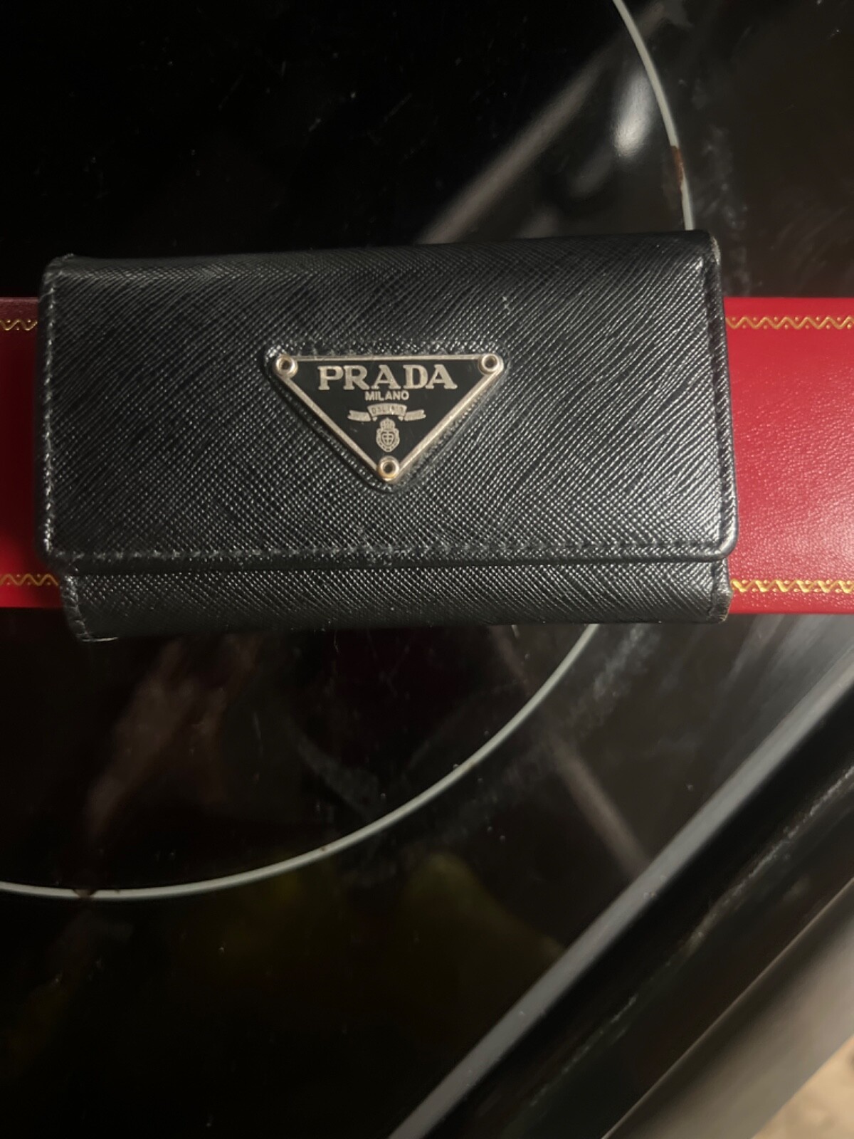 Prada Black Saffiano Leather Trifold Wallet in Very Good Condition-image