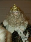 Old World Saint Nick Riding on a Wooden Horse Holding a Bird in a Cage  — photo 5