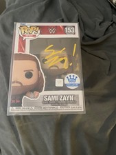 Sami zayn signed and inscribed funko w/jsa and hard protector 
