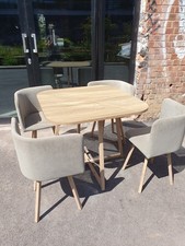 Garden or Patio Table 34.5" x 34.5" + 4 Chairs - slight damage to the tabletop 