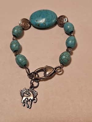 Turquoise Beaded Bracelet with a Capricorn Zodiac Charm