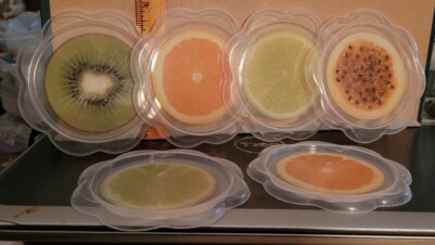Vintage Plastic COASTERS WITH LIME ORANGE KIWI AND POMEGRANATE IMAGES ON THEM