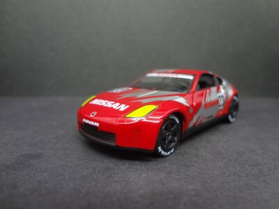 Johnny Lightning 2006 Nissan 350Z #23 red/silver ADVAN