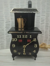 Plastic Stove Wall Clock vintage MCM kitsch Spartus USA works Some Pitting