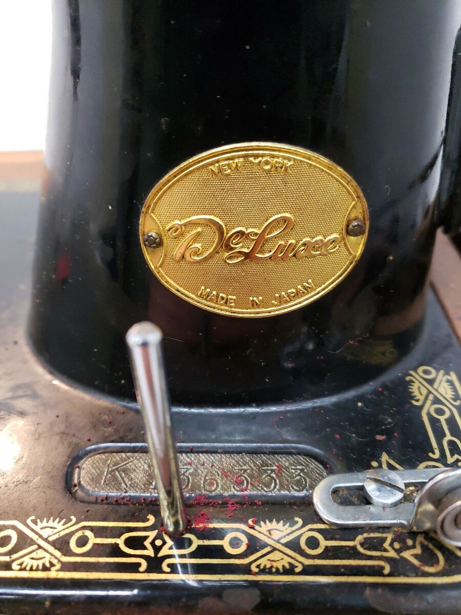Vintage DeLuxe Brand Fabric Sewing Machine, New York Vintage DeLuxe Brand Fabric Sewing Machine, New York