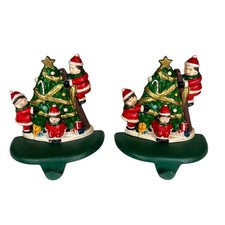 Vintage Cast Iron Christmas Stocking Holders Hanger Santa Elves Tree Set of 2