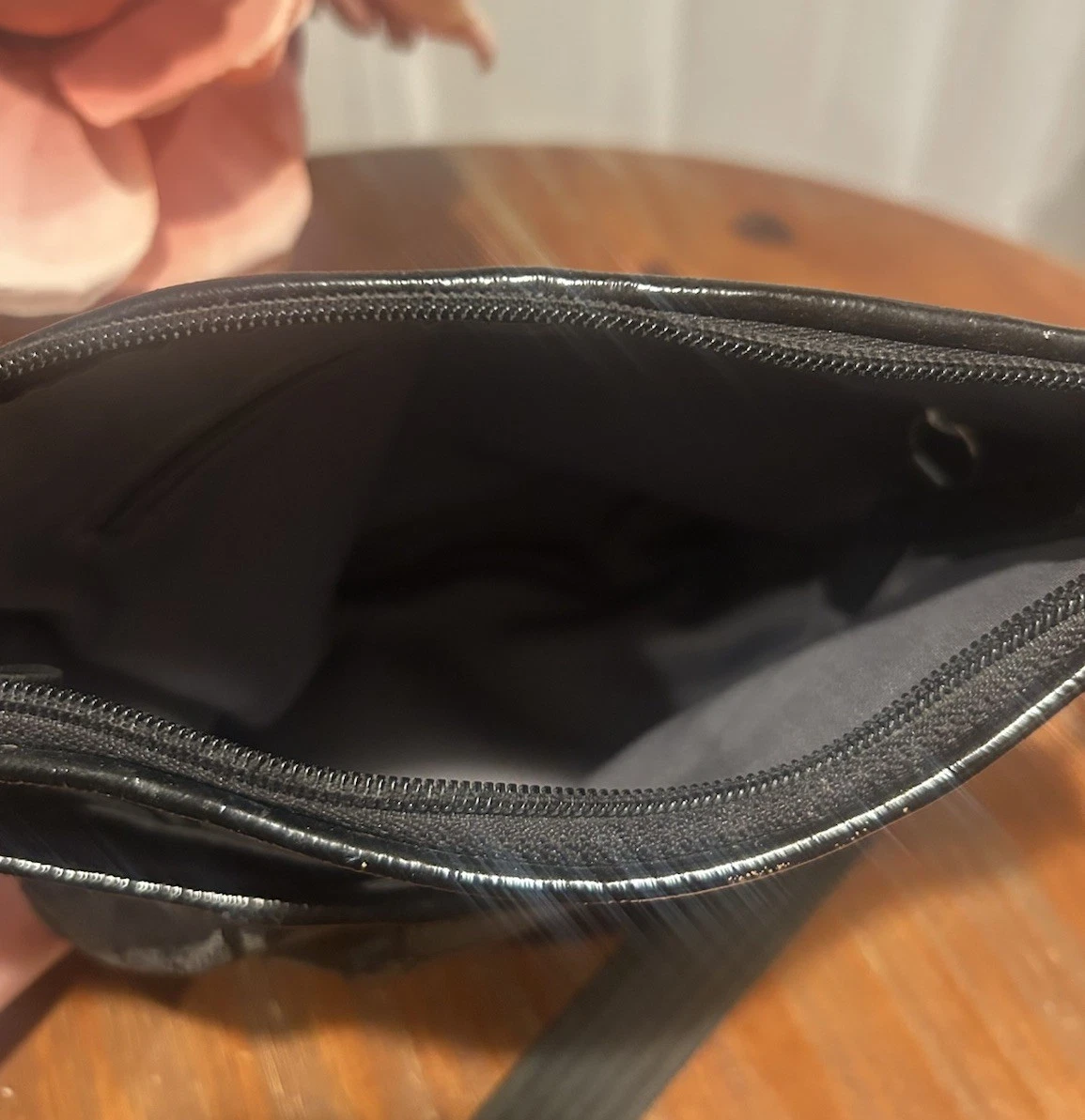 Borsa messenger Coach Signature jacquard plissettata swingpack nera